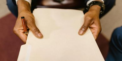 Image shows a process server performing a litigation search.