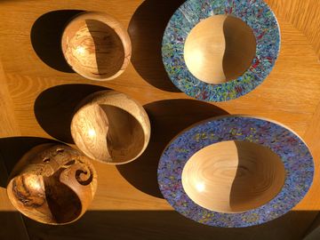 Hand painted birch and ash platters and spalted beech bowls.