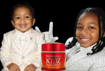 Two happy children in white outfits with a red Kidz eczema relief jar.