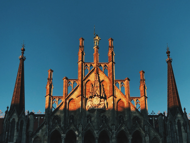 A church with beautiful sunrays over it