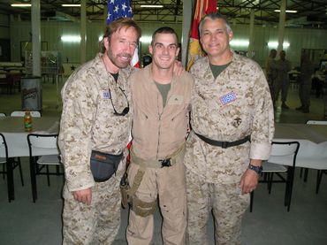 Cpl James McHann with the legendary Chuck Norris.