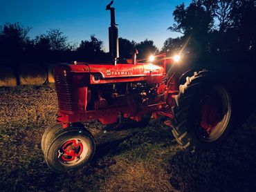 A McCormick International Harvester SuperM Tractor.  This is a In Memory Of Larry J Silvey.  