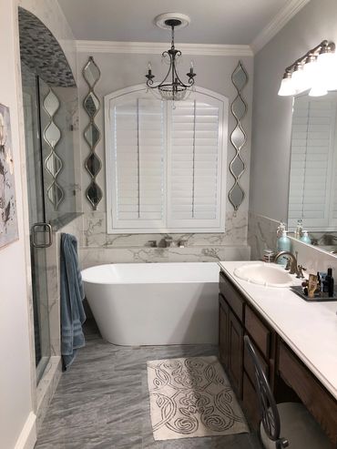 Custom Eyebrow Wood Shutter in a bathroom STANDARD TILT (RABBIT AND HOLE)