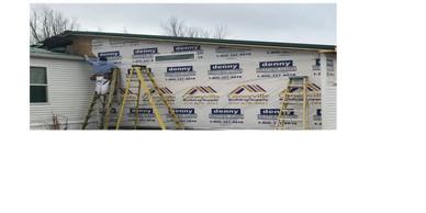 Workers build addition Universal Interiors in Clarkson, KY, using ladders. #SidingInstallation

