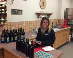 Woman bottling her wine