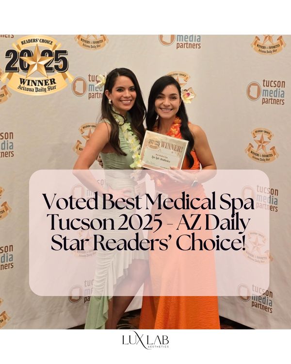 Two women celebrate Lux Lab Aesthetics winning Best Medical Spa Tucson 2025.