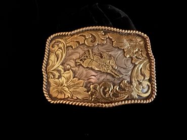 German Silver with Brass overlays.  Hand sculpted bareback rider