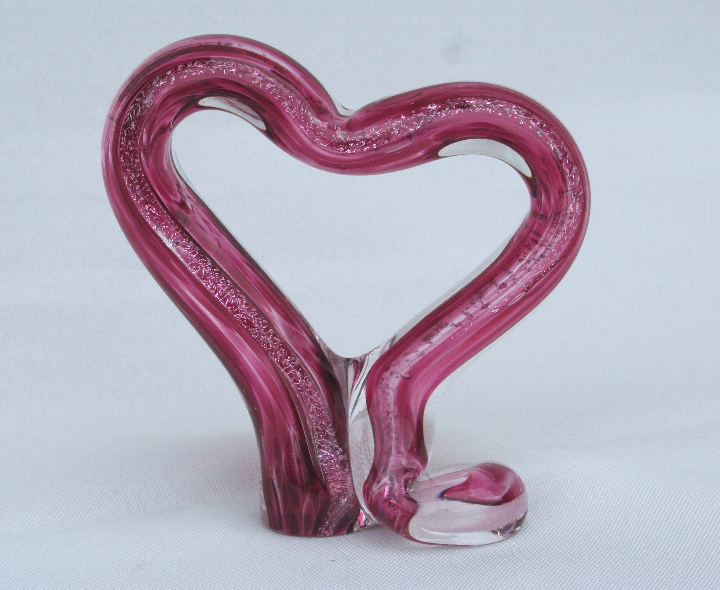 Hearts made single or as a double.  All have a swirl of dichroic glass in them.