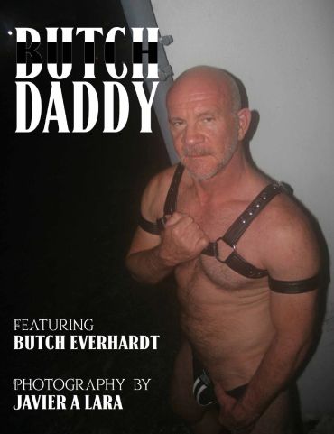 Mature man in leather harness posing for Butch Daddy cover.