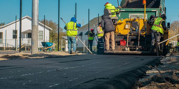 The Atlantic Coast Paving Crew. Asphalt paving example. 
