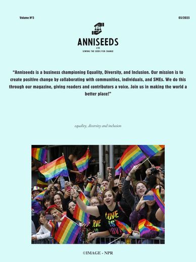 Crowd celebrating LGBTQ+ pride with rainbow flags and colorful attire.