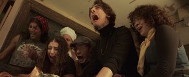Group of friends shocked and surprised indoors.