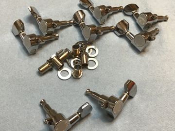 Enclosed chrome mini tuning pegs