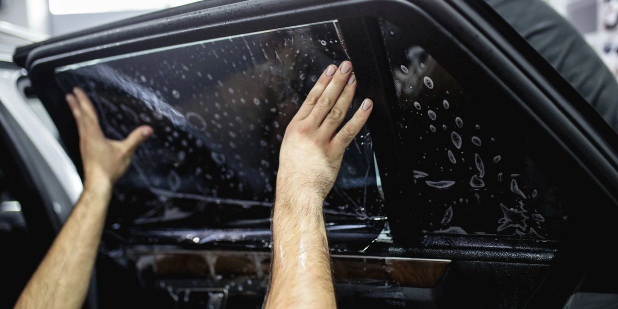 Window tint, showing a vehicles tints being displayed on the window tinting services page.