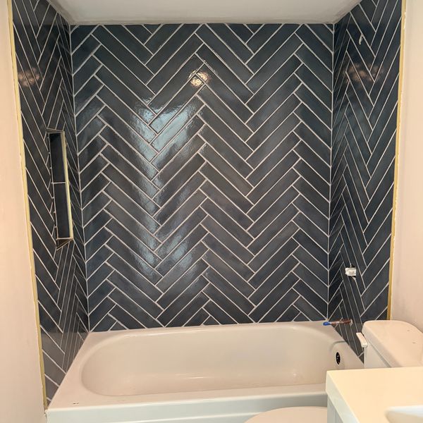 Herringbone tile installation - Boynton Beach Bathroom Renovation 