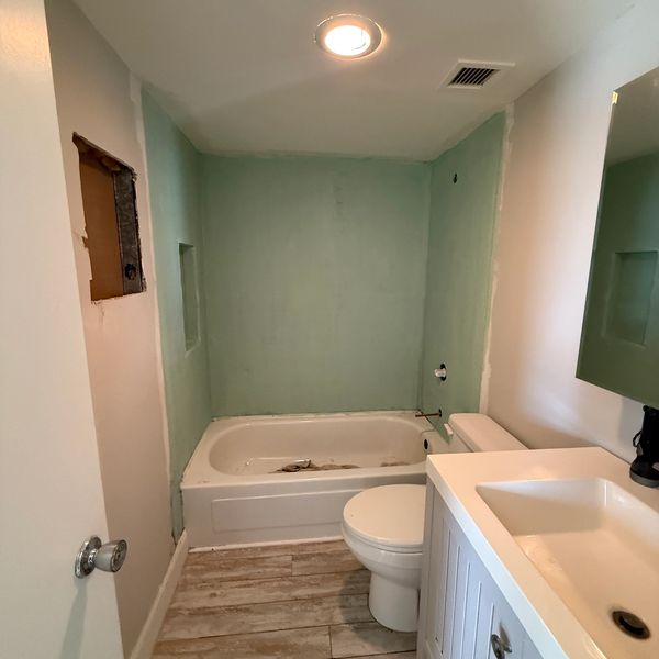 Cement board sealing before tile. Boynton Beach Bathroom Renovation
