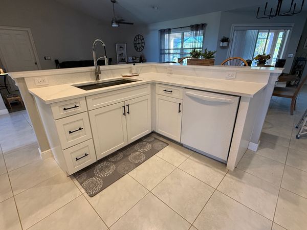 white cabinets with quartz countertops