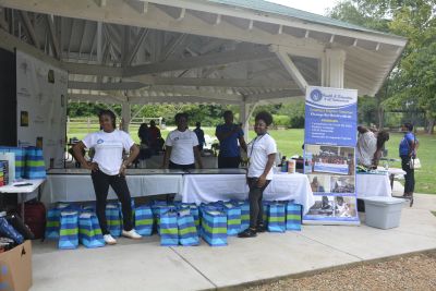 Giving out highly needed school supplies to students, Charlotte, NC - USA