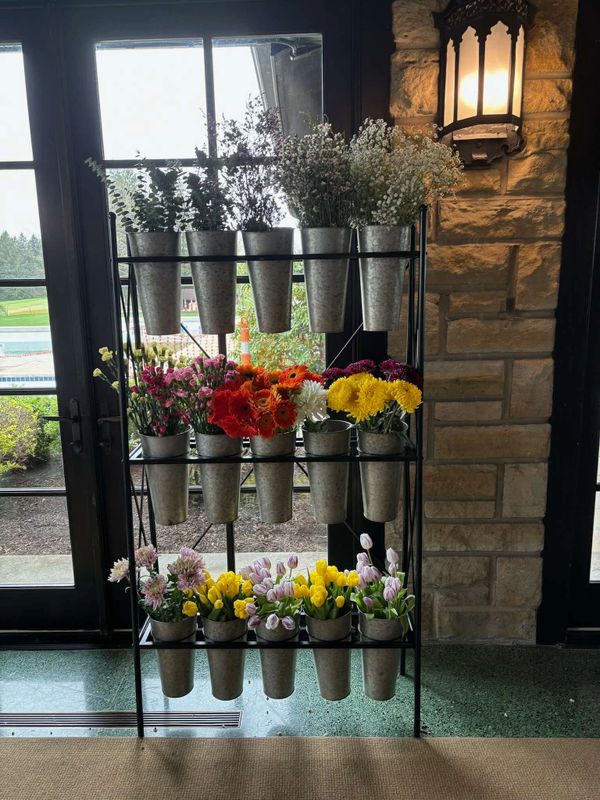 15 Bucket Flower Bar Stand at a bridal shower. 