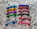 Bottle opener keychains, great for weddings or business logos.