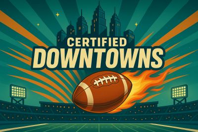 A flaming football with city skyline and stadium lights, labeled Certified Downtowns.