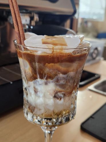 Iced Carmel Latte with Cinnamon Stick in Vintage Glassware