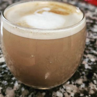 Double Latte in glassware