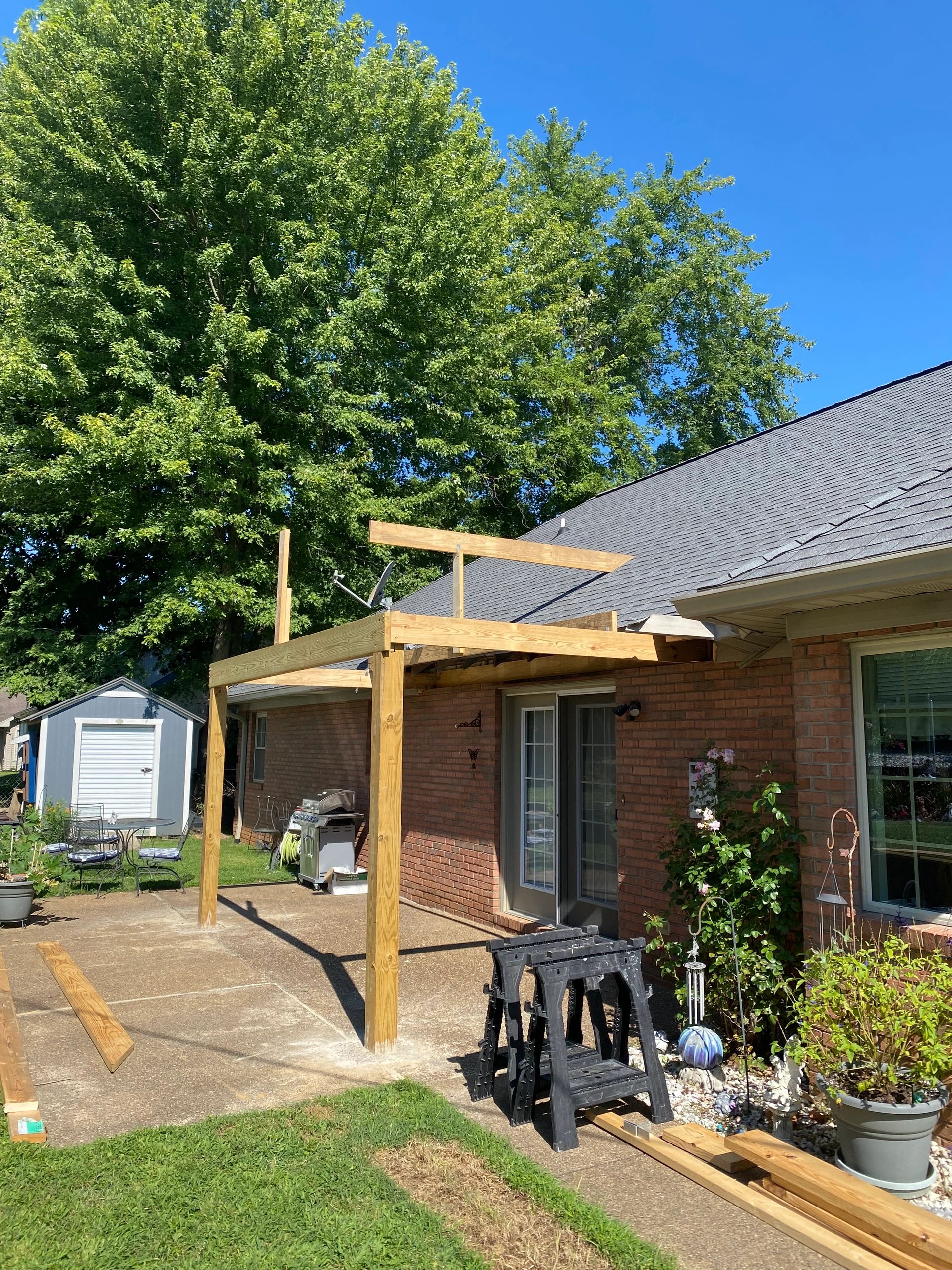 Framing stages of screened in porch project by Legacy Construction EVV