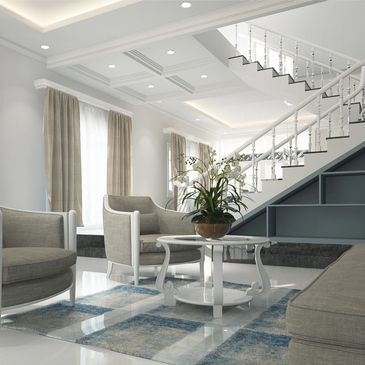 Modern living room with stairs and neutral tones.