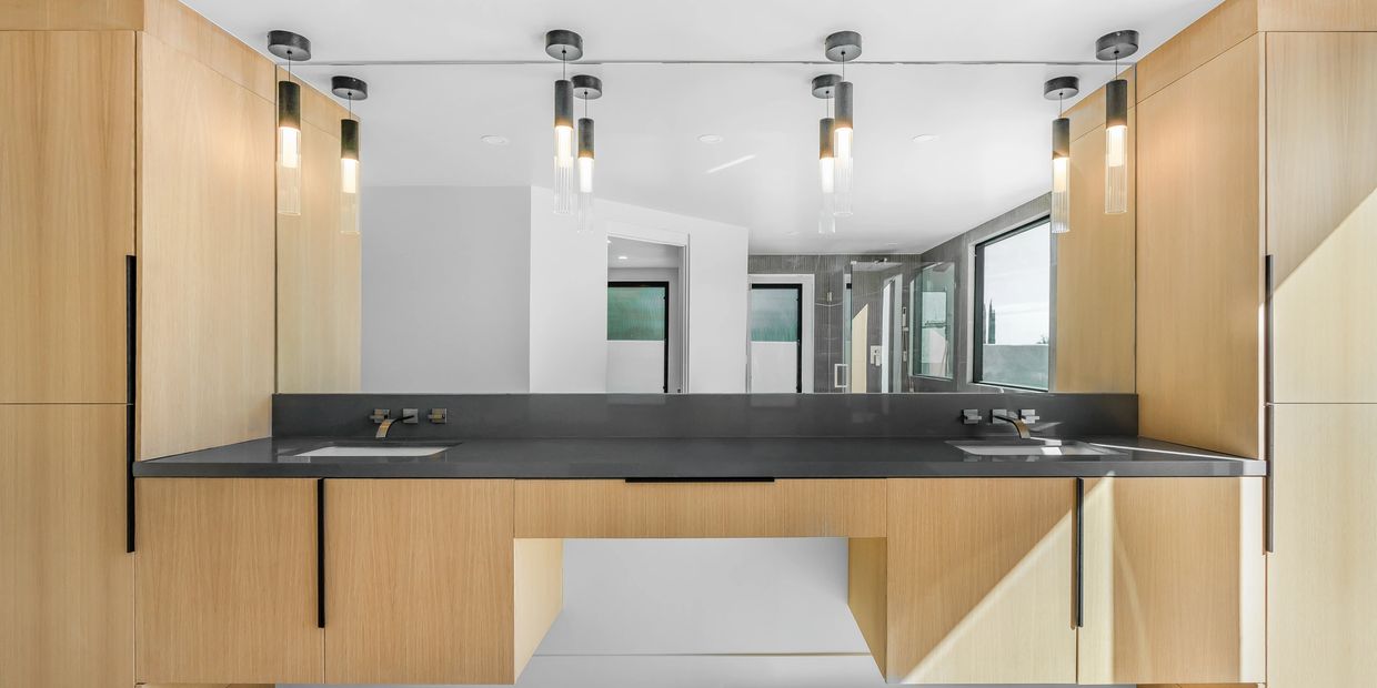 Luxury bathroom remodel in Temecula CA with custom vanity and walk-in shower