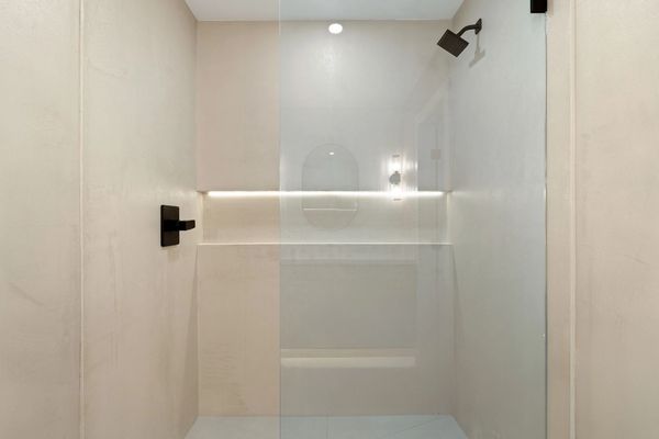 Niche lighting in shower. Plaster shower. High end shower in Canyon Lake, CA by Justice Renovations.