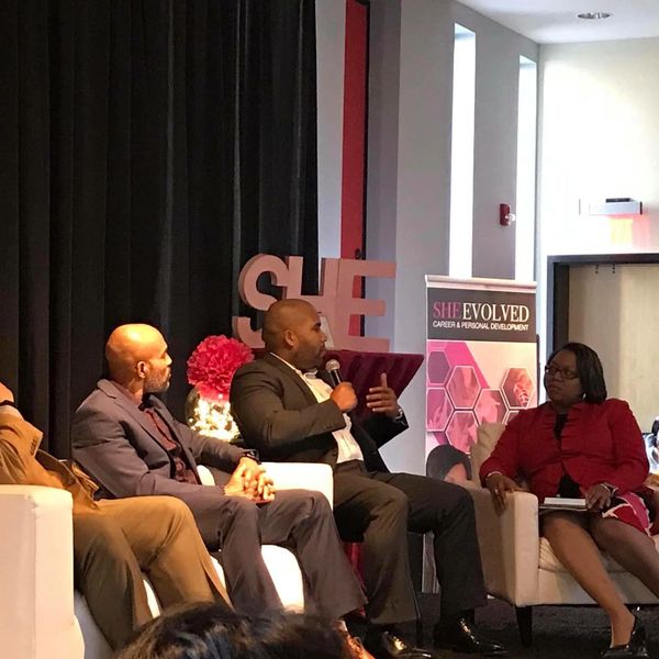 Panel discussion at a career and personal development event.