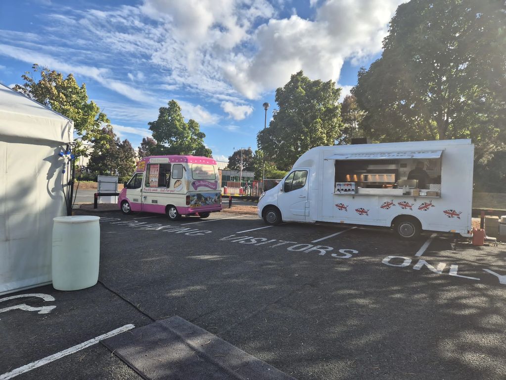 THP Corporate Catering setup with Ice Cream Van and Corporate Catering Van ready to serve