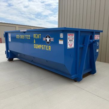 Large blue dumpster with rental contact information and safety notices.