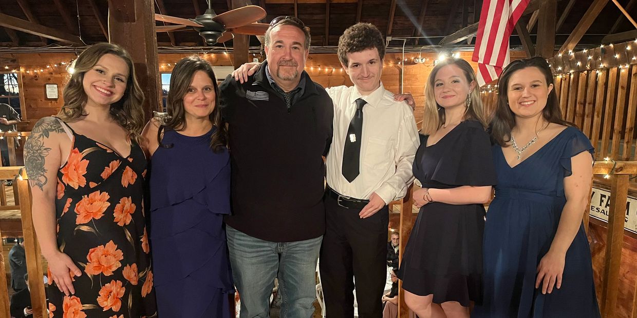 Joshua Hodson is featured with his wife, Josee, and his 4 children. 
