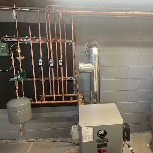 Boiler system with PurePro tank and copper pipes. Set up done by Joshua Hodson.