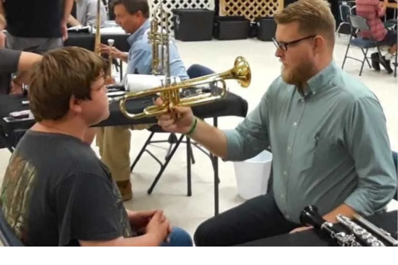 Mr. Campbell helping with an instrument fitting