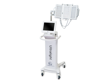 Ultralight medical device with a monitor and adjustable LED panel on wheels.