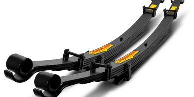 Pair of black leaf springs for vehicle suspension.
