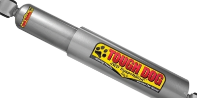Silver Tough Dog shock absorber for vehicle suspension.