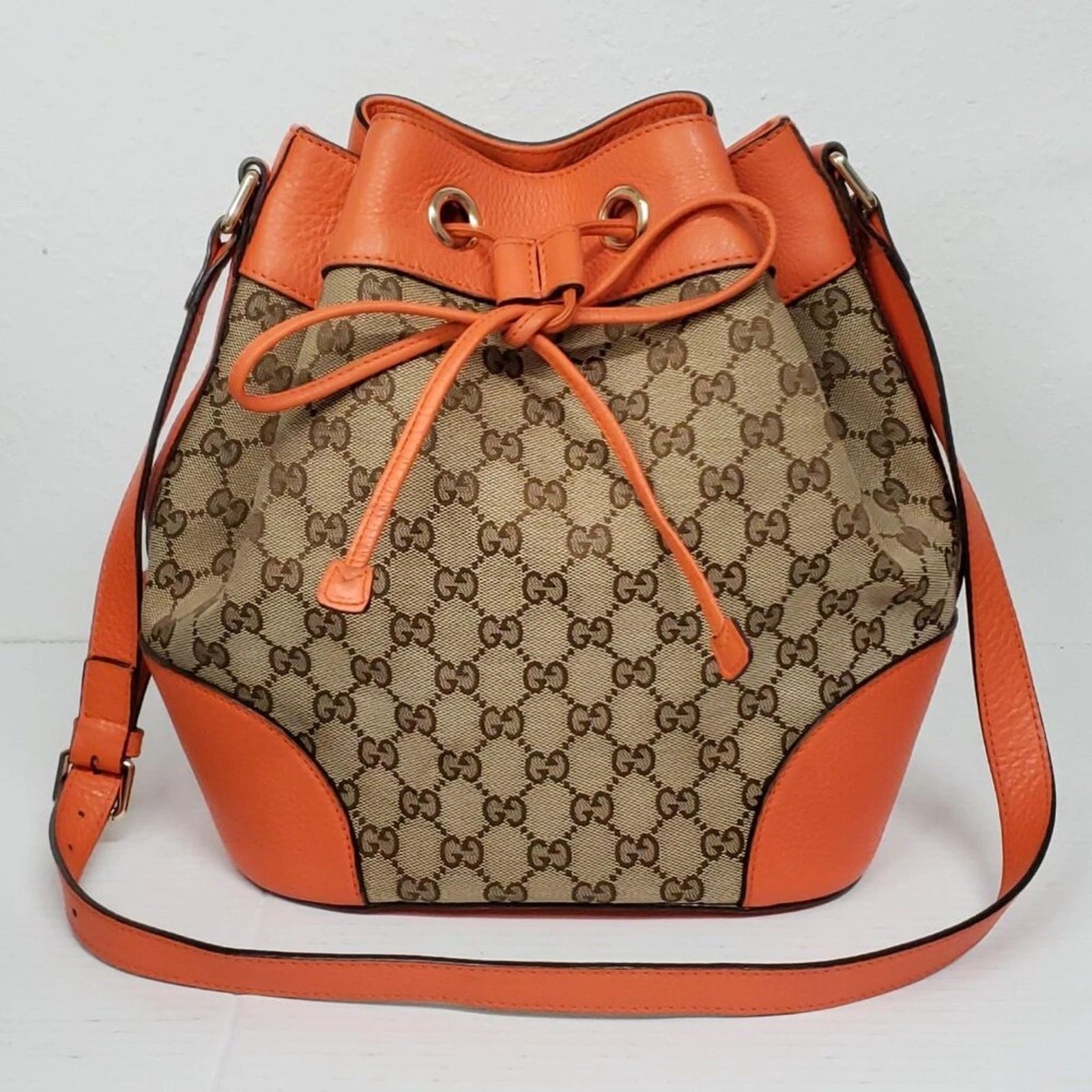 Gucci GG Supreme Bucket Bag Orange Leather Trim Crossbody Drawstring — photo 2