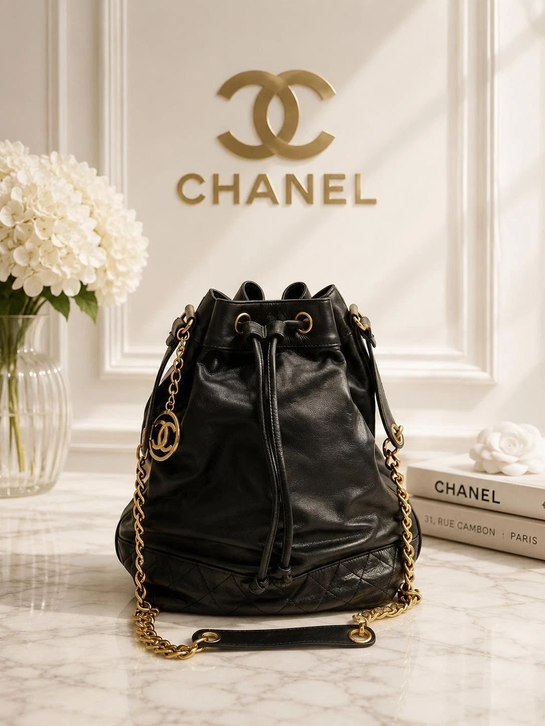 Chanel Authentic Chanel Drawstring Bucket Bag Black Leather Gold Chain CC Logo