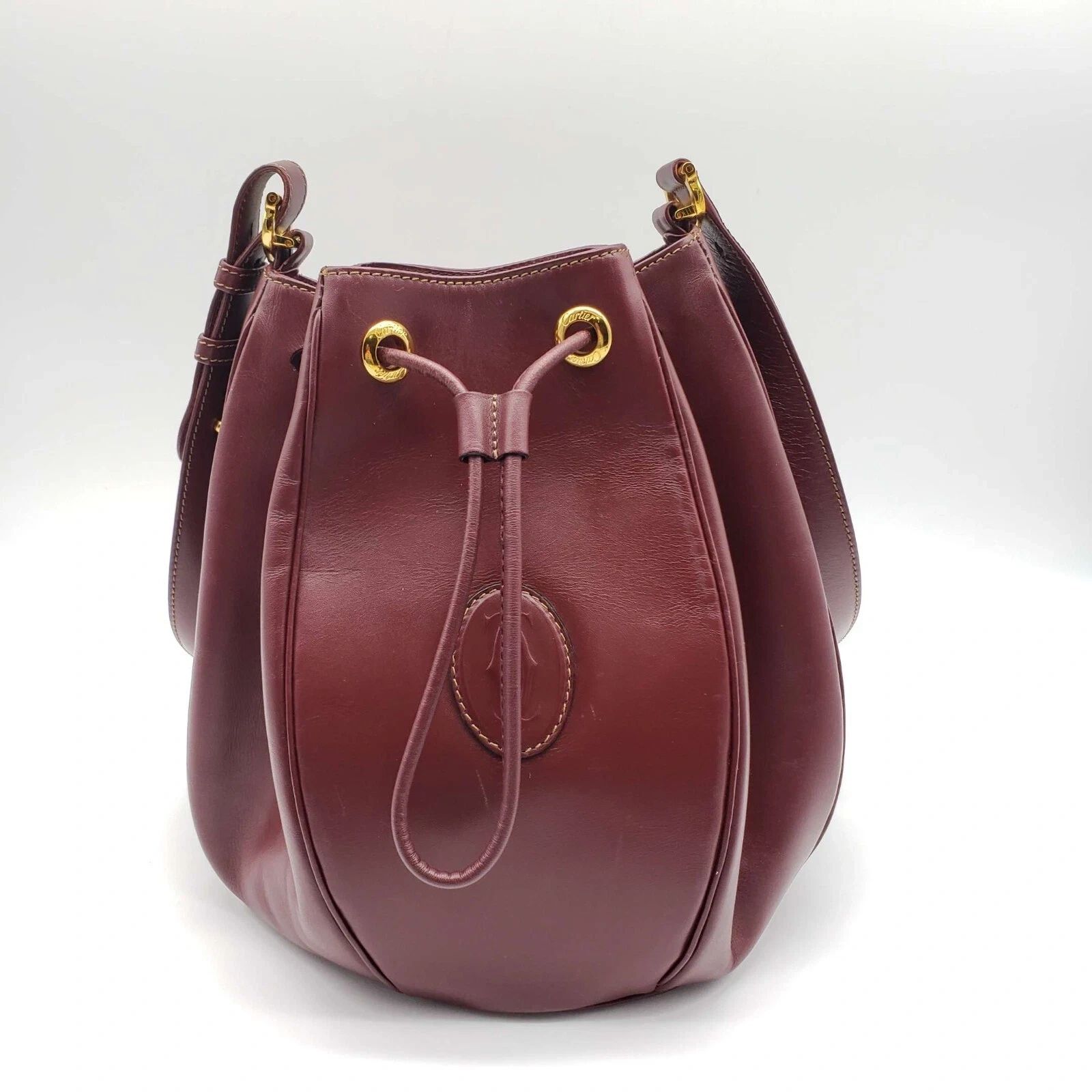 Cartier Burgundy Leather Bucket Bag Drawstring Crossbody — photo 2