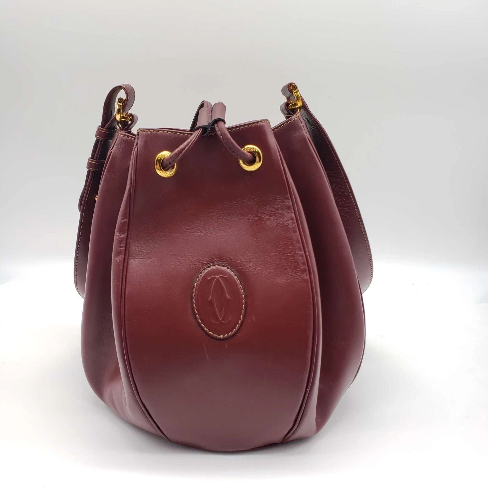 Cartier Burgundy Leather Bucket Bag Drawstring Crossbody — photo 3