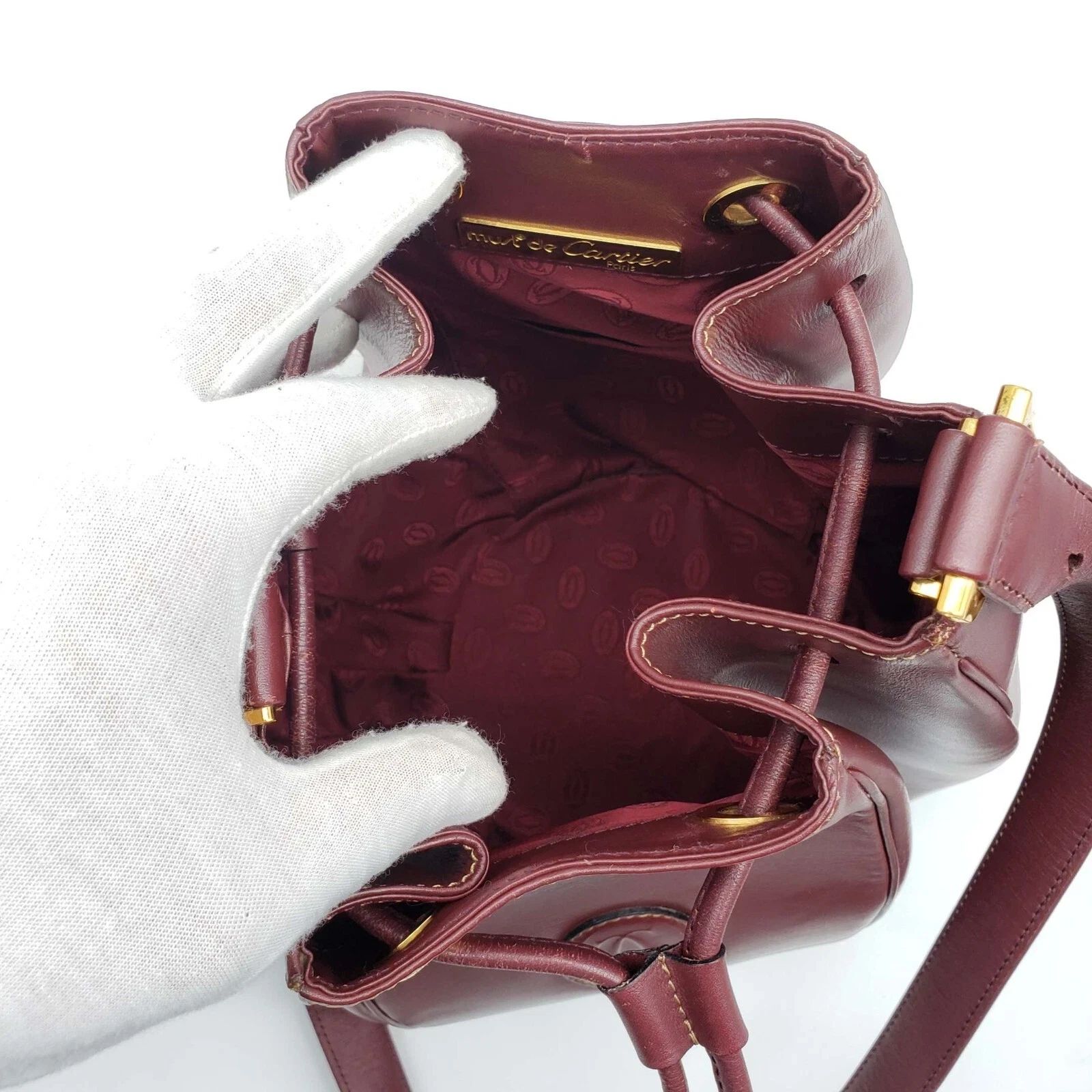 Cartier Burgundy Leather Bucket Bag Drawstring Crossbody — photo 8