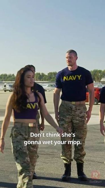 Military personnel with a humorous Navy caption.