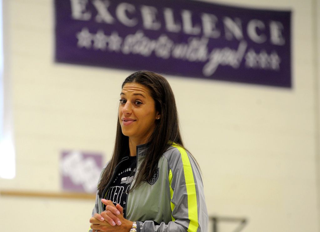 Soccer great Carli Lloyd speaking to students at Mount Laurel school
