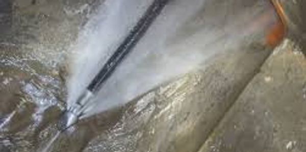 Effective drain clearing with water jet on a drain in St Helens
