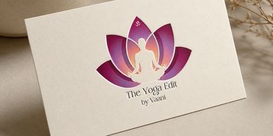 Elegant business card featuring a yoga silhouette inside a lotus flower logo.