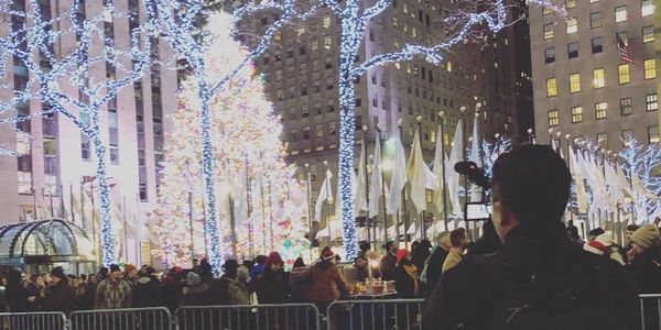 taking a video of a christmas tree in manhattan, new york. photography